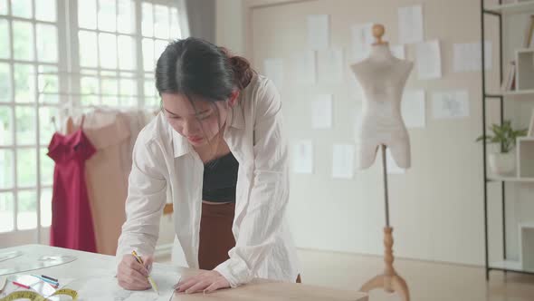 Asian Female Fashion Designer Sketches Of Clothing alt