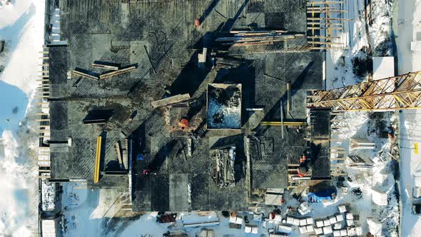 View From Above of a Building Site on Top of a Residential House alt
