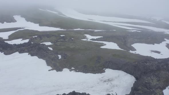 The Magma Stone Field of Gorely Volcano Covered with Fog