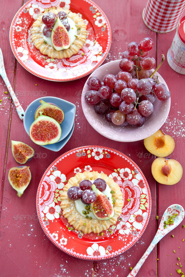 Little tarts with grapes and figs - Stock Photo - Images