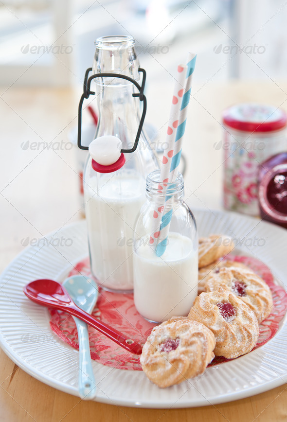 Milk bottles and cookies - Stock Photo - Images