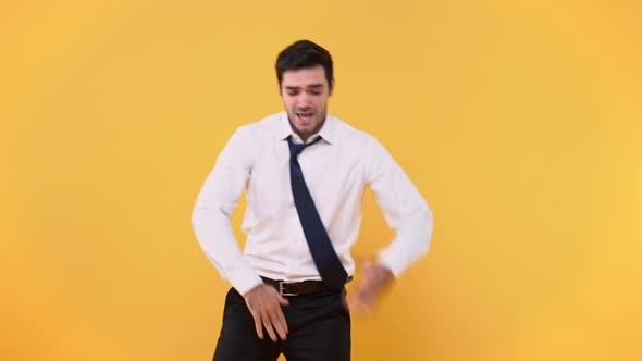 Funny happy Caucasian businessman celebrating and dancing after work