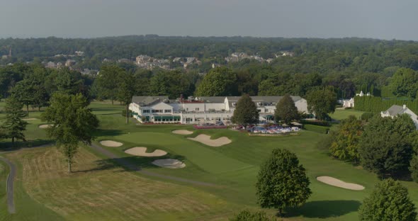 Backwards Aerial Pan of a Golf Club Course in Glen Head Long Island alt