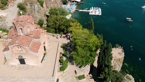Aerial shot of Macedonia coast. Clif and beautiful water around Ohrid Lake in Southern Europe. Churc alt