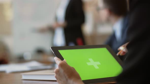 Close-up of the Tablet with a Green Screen alt