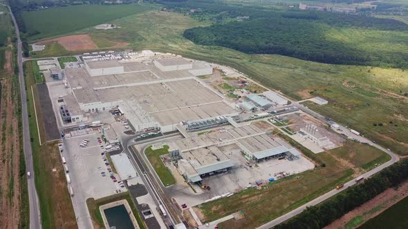 Aerial view of modern factory. Industrial exterior alt