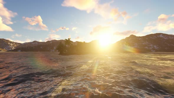 The sun sets in the middle of the sea alt