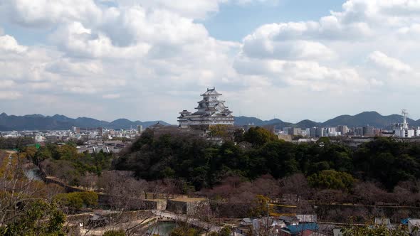 Japanese Himeji Castle on Hill By City Timelapse alt