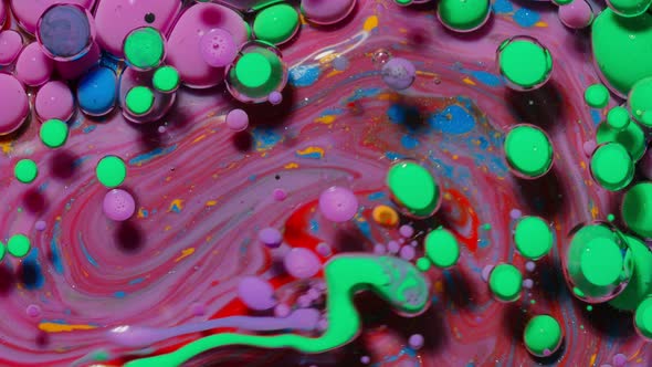 Bright Neon Colorful Bubbles Oil and Ink Acrylic Paint Moving Closeup Wallpaper Background alt