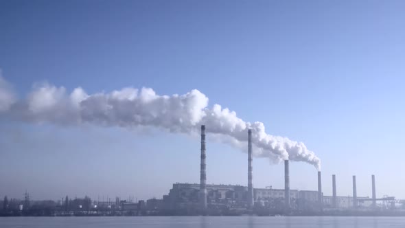 Smoke From the Chimneys Plant Rises Into the Clouds 001 alt