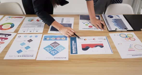 Closeup of hand woman manager employee pointing at business document alt