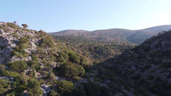 Landscape of High Hills in Crete on the Background of the Sky alt