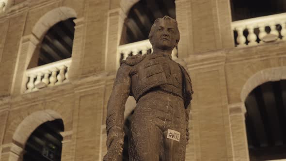 Statue of Toreador Manolo Montoliu on Plaza De Toros in Night Valencia alt