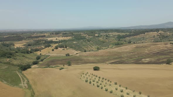 Aerial images of Tuscany in Italy cultivated fields summer,  Drone aerial images of crop areas alt