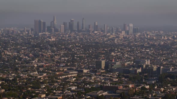 Aerial of houses and buildings in city alt