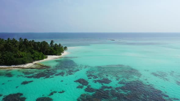 Aerial sky of marine sea view beach voyage by shallow water with white sand background of a dayout n alt
