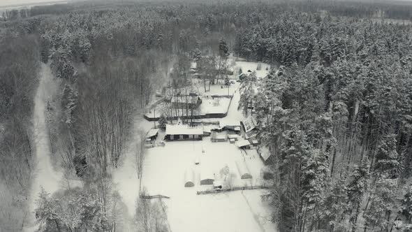 Winter Landscape of a Russian Village in the Forest