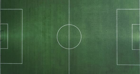 Aerial View Of Green Football, Soccer Pitch. Top Down View On A Green 