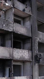 Vertical Video of a Destroyed Residential Building in Ukraine During the War alt