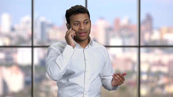 Successful Businessman Talking on Transparent Phone alt