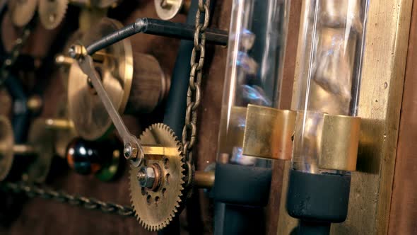 Steampunk, the Mechanism of a Time Machine with Rotating Gears, Flasks in Which Bubbles in a Liquid alt