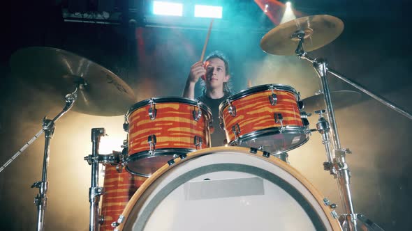 Clouded Studio with a Professional Drummer Having a Rehearsal in It alt