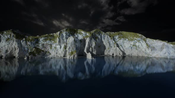 Fjord with Dark Storm Clouds alt