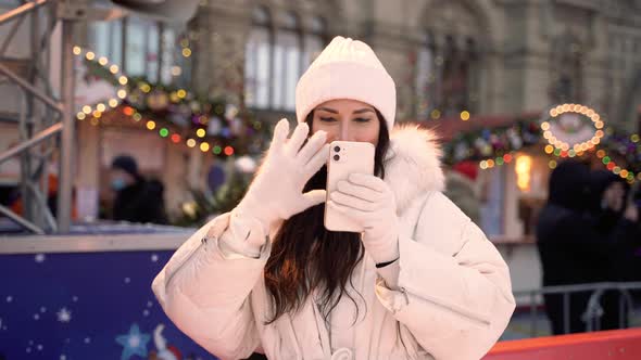 Christmas Ice Rink with a Brunette Girl