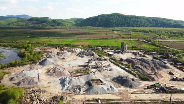 Aerial View Flight Over a Large Plant for the Production of Stone and Rubble of Various Fractions alt