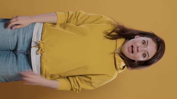 Portrait of Smiling Woman Having an Idea Thinking Being Spontaneous Touching Temples with Index alt