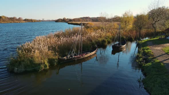 Aerial Shot By The Lake, With Ancient Boats