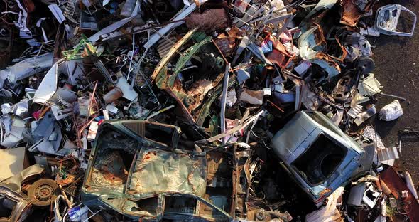 Vehicle scrap ready for recycling, thus helping the environment, will melt and turn to steel again t alt
