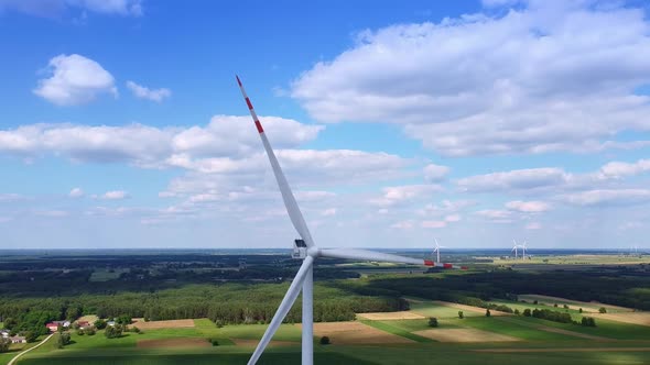 Close Up Shot of Big Windmill on the Blue Sky alt