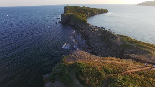 Drone View of a Beautiful Peninsula Tobizina with Vertical Cliffs at Sunset alt