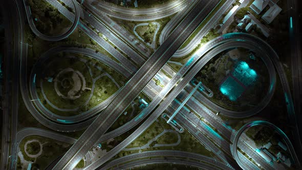 Aerial view shot of fast moving above interchange and multi junction road alt