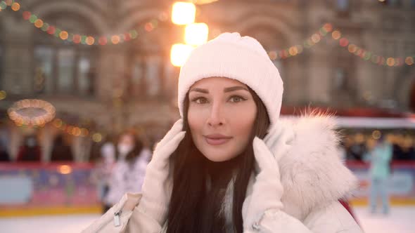 Christmas Ice Rink with a Brunette Girl