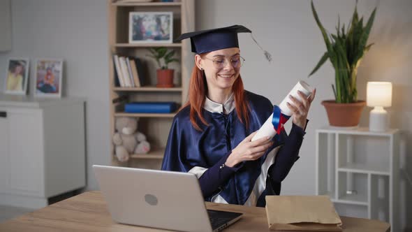 Distance Online Education Young Female Student University Graduate in Academic Clothes with Diploma alt