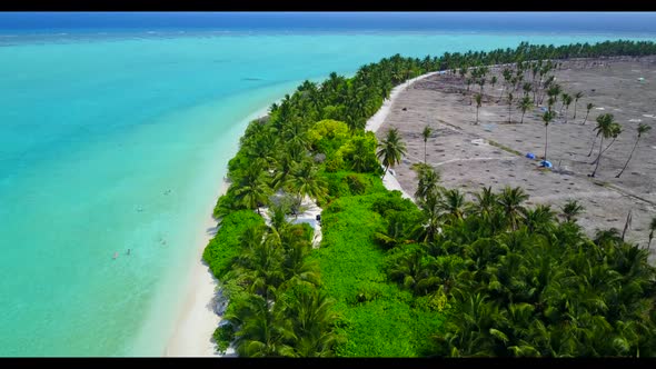 Aerial top view seascape of tropical tourist beach voyage by blue sea with white sandy background of alt