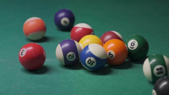 the cue ball breaks with spaced balls alt
