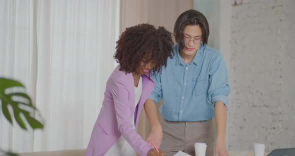 The business team is working and resting at the home Business team is drinking coffee Home office alt