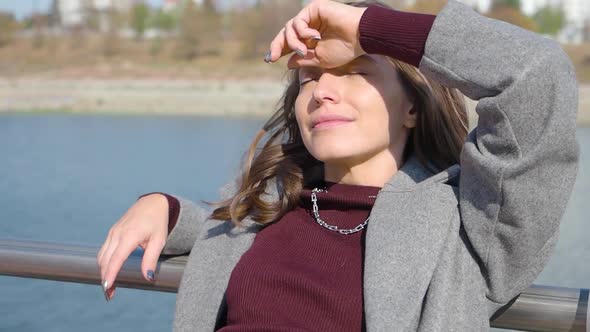 Digital Detoxification Concept 35Yearold Woman Taking a Break From Office Hustle and Bustle on a alt