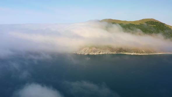 Mystical Island Askold Shrouded in Morning Mist alt