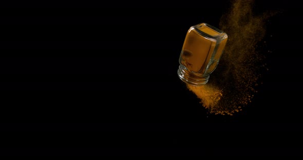 Turmeric, curcuma longa, Powder falling against Black Background, Indian Spice, Slow Motion 4K alt