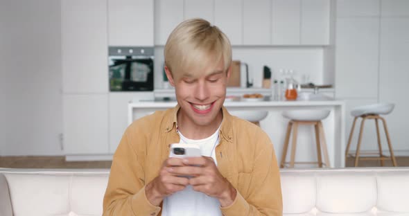 Amazed Man Receiving Sms Message Offer Opportunity Happy Male Reading Good News in Smartphone alt