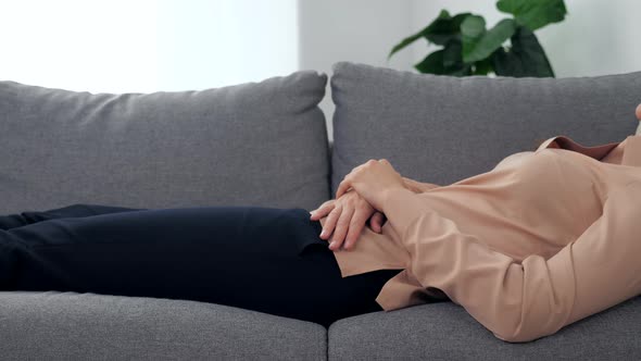 Adult Woman with Mental Health Problems Lying on Couch Talking to Psychologist alt