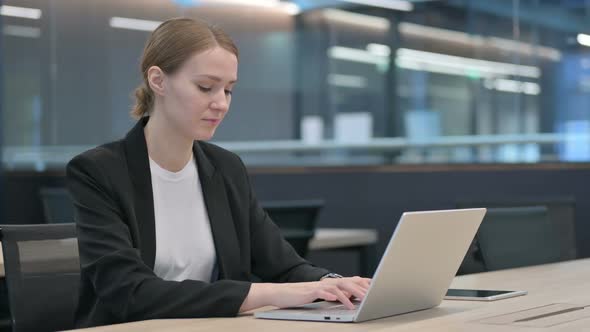 Woman Closing Laptop Standing Up Going Away alt
