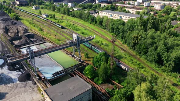 Aerial View Container Freight Train. Freight train passing to distance at line railway alt