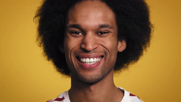 Video of facial expressions of a young African man.Shot with RED helium camera in 8K alt