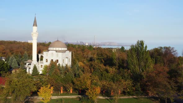 The building of a mosque among autumn trees