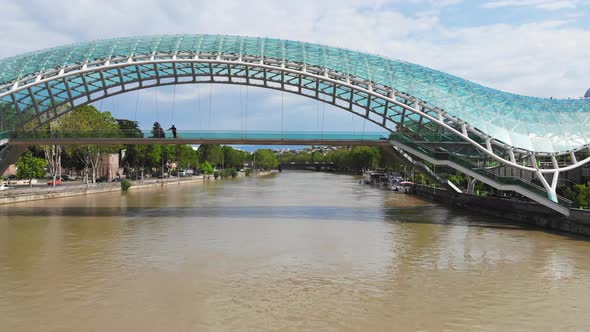 Fly Below Peace Bridge In Tbilisi alt
